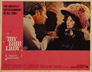 A lobby card of Higgins and Eliza